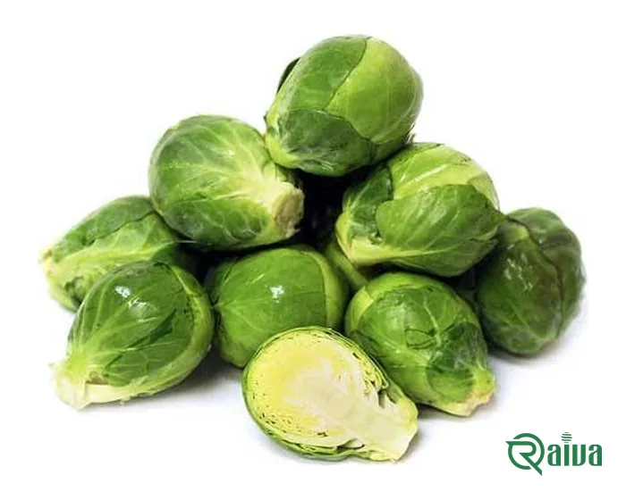 Brussels sprouts trimmed from the stalk, one cut in half