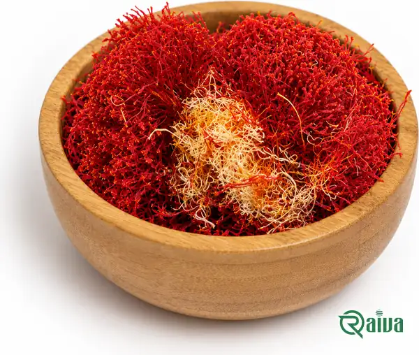 Bunches of red saffron filaments with their pale yellow styles, in a wooden bowl (view 1)