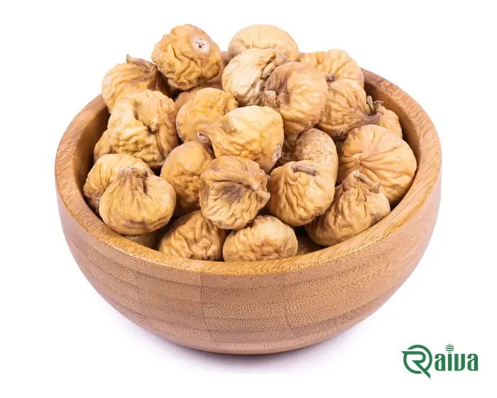 Whole pale dried figs in a wooden bowl
