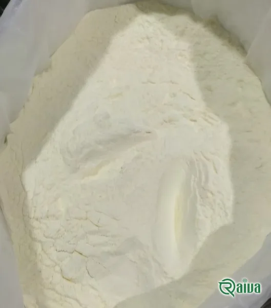 A green and white bulk bag of skimmed milk powder (view 3)