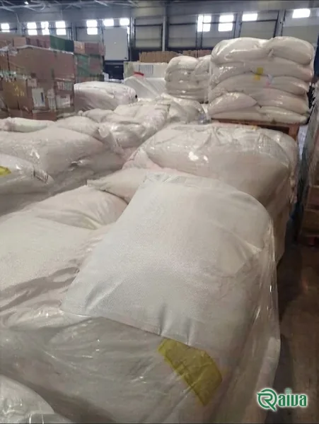 A green and white bulk bag of skimmed milk powder (view 4)