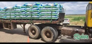 A green and white bulk bag of skimmed milk powder (view 5)