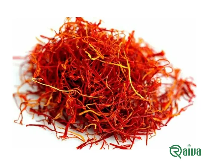 Loose red saffron threads, some with their orange-yellow style ends