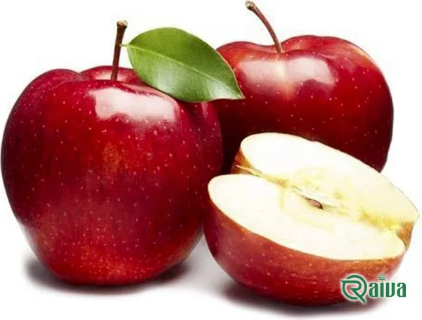 Red apples with one cut to show pale firm flesh (view 6)