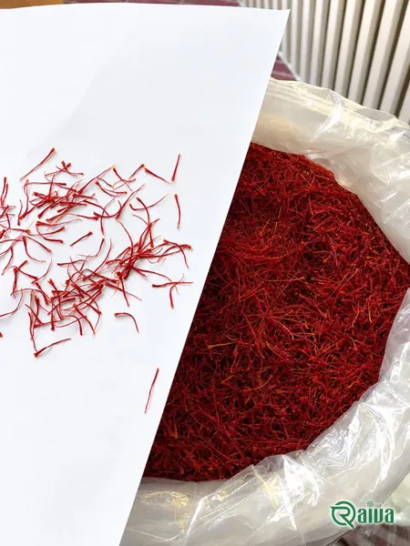 All-red Sargol saffron threads heaped in a wooden bowl (view 3)