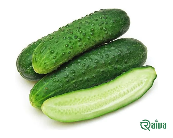 Short, bumpy-skinned spiny cucumbers beside one cut lengthwise