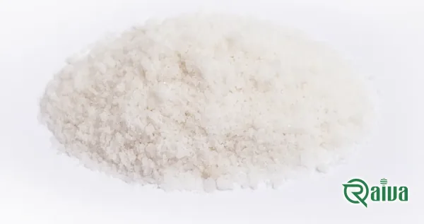 Refined white salt in a black bowl (view 5)